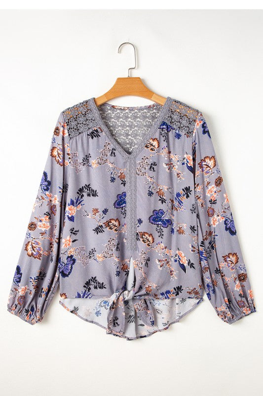 Feminine V-neckline frames the décolletage beautifully. 