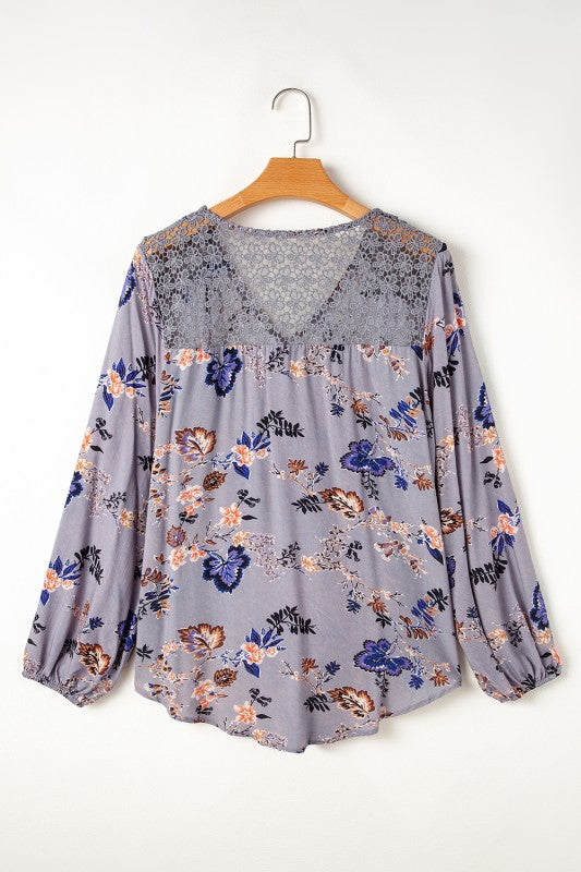 Knot front at the hem adds a trendy twist and flattering fit. 