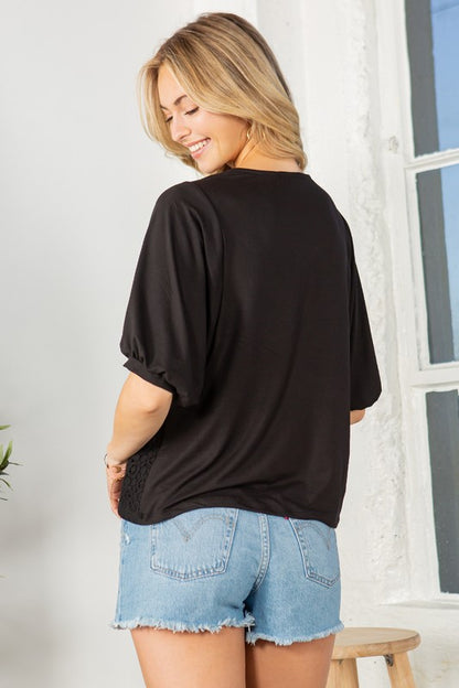 Puff sleeves float above a lace-detailed front for balance and sophistication.