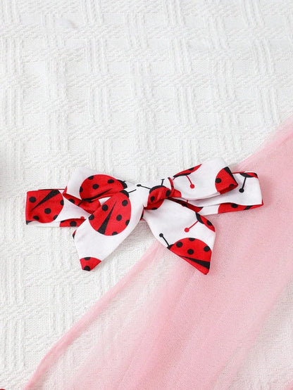 Baby outfit set with ladybug print: short-sleeve top and matching bottoms in soft fabric (sizes 6 months to 3 years)

