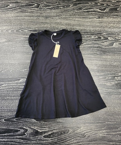 Kids bamboo tulip dress with ruffle sleeves, side pockets, and a relaxed fit — breathable and gentle on sensitive skin


