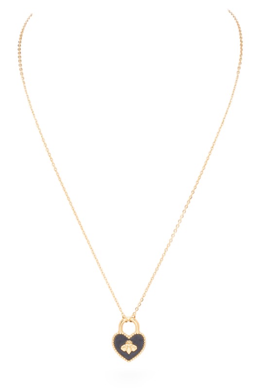 A necklace with a heart-shaped pendant. The pendant is designed like a padlock with a gold outline and a black background. There's a gold bee in the middle of the heart. The chain is gold too.