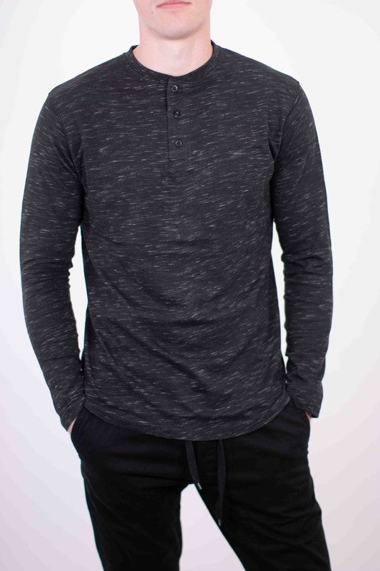 A versatile long-sleeve Henley tee that combines casual comfort with timeless style, featuring a buttoned placket and soft, breathable fabric for everyday wear.

