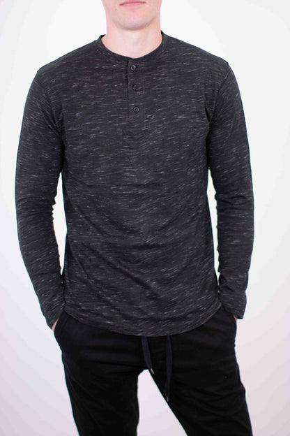 A versatile long-sleeve Henley tee that combines casual comfort with timeless style, featuring a buttoned placket and soft, breathable fabric for everyday wear.

