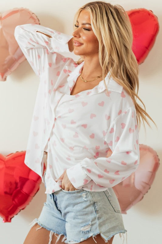 Puff sleeves add volume and playful flair to the look. 