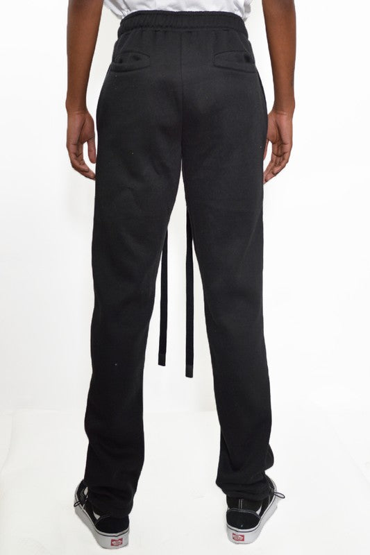 These sweatpants are your go-to for comfort that doesn’t quit. Crafted from thick, breathable cotton fleece, they deliver warmth without the bulk—perfect for chilly mornings, laid-back weekends, or post-workout recovery