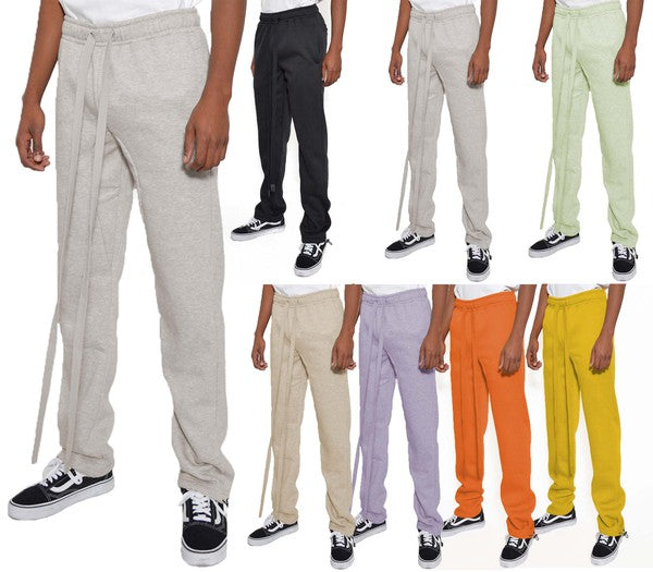 These sweatpants are the definition of cozy confidence. Made from thick, breathable cotton fleece, they deliver warmth without the bulk—perfect for cool mornings, laid-back weekends, or post-workout recovery. The soft interior feels like a hug, while the elastic waistband with drawstring gives you a secure, adjustable fit.