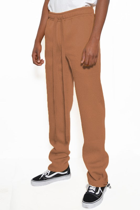 These sweatpants are your go-to for comfort that doesn’t quit. Crafted from thick, breathable cotton fleece, they deliver warmth without the bulk—perfect for chilly mornings, laid-back weekends, or post-workout recovery