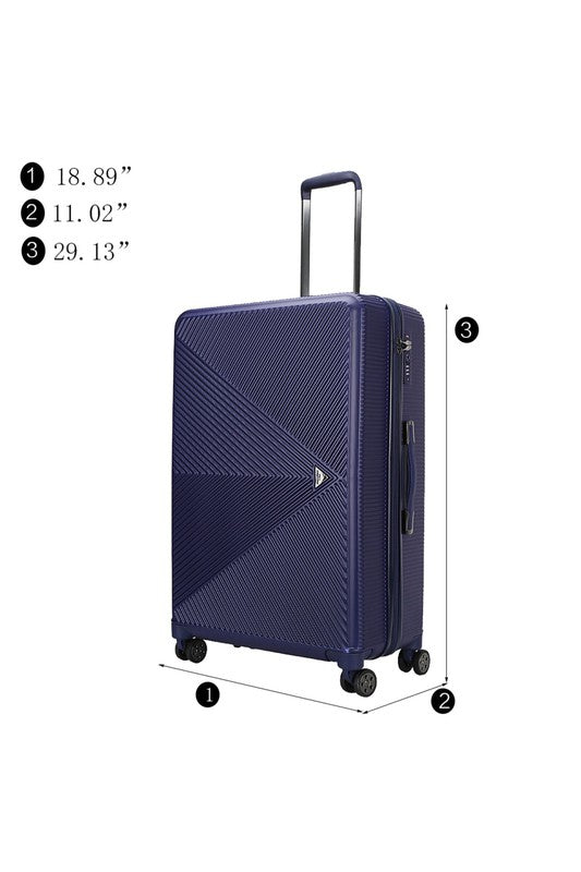 a durable hardshell suitcase with a modern geometric textured design and spinner wheels.