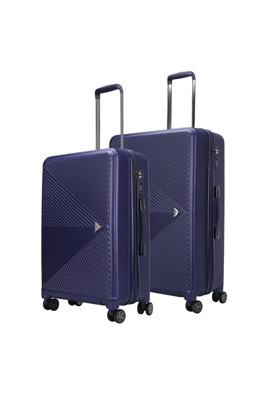 Modern textured travel bag with smooth-rolling wheels, perfect for short trips or extended travel.