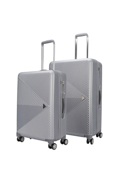Modern textured travel bag with smooth-rolling wheels, perfect for short trips or extended travel.