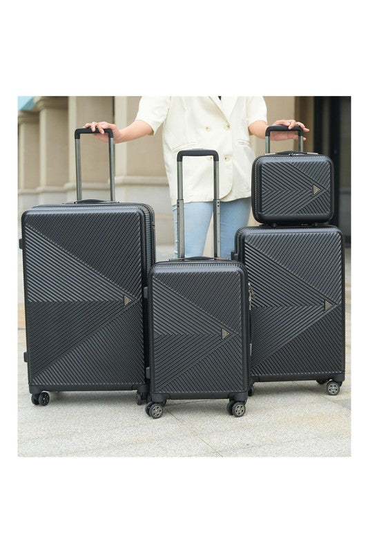Four-piece hardshell luggage set with a modern geometric textured design and smooth spinner wheels