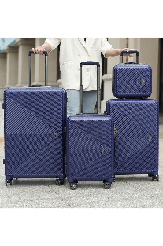 Four-piece hardshell luggage set with a modern geometric textured design and smooth spinner wheels