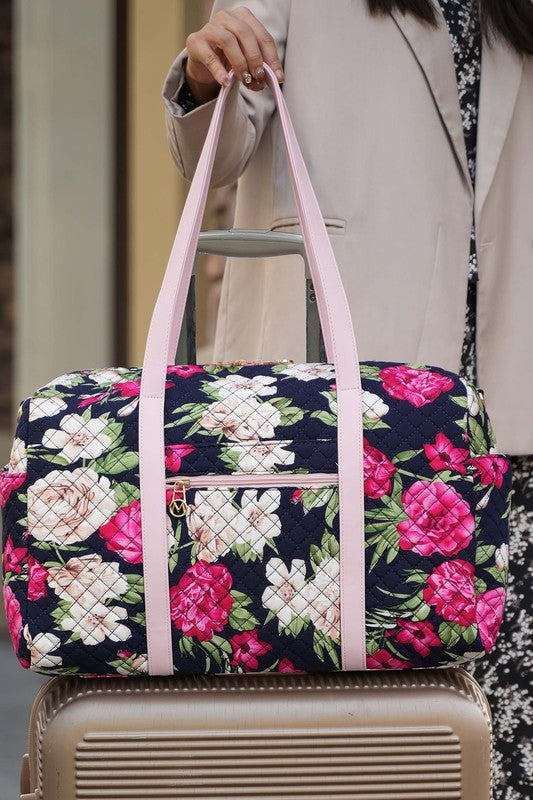 Fashionable quilted travel carry-on in a sleek color, offering comfortable and chic transport.