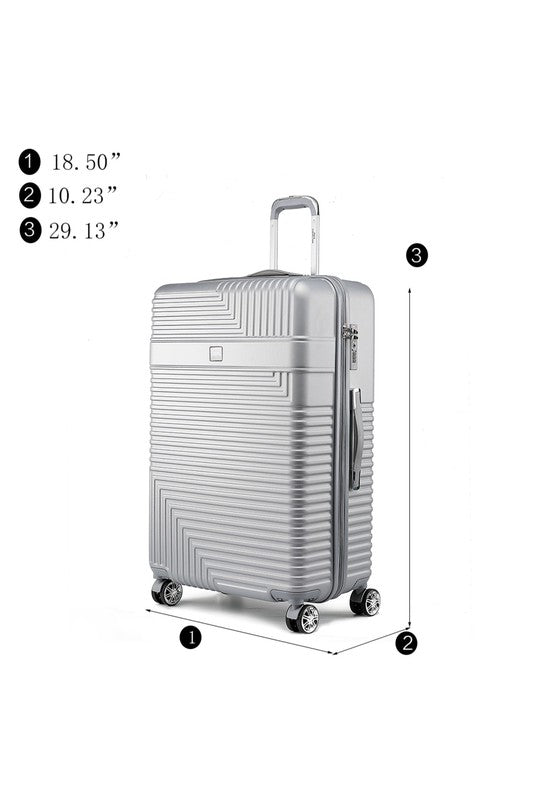 Durable hardshell luggage with a modern ribbed texture and smooth-rolling spinner wheels.