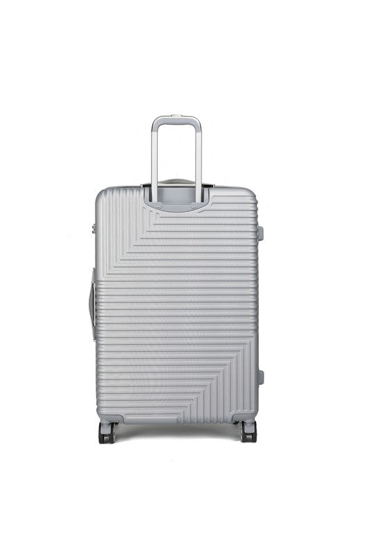 Durable hardshell luggage with a modern ribbed texture and smooth-rolling spinner wheels.