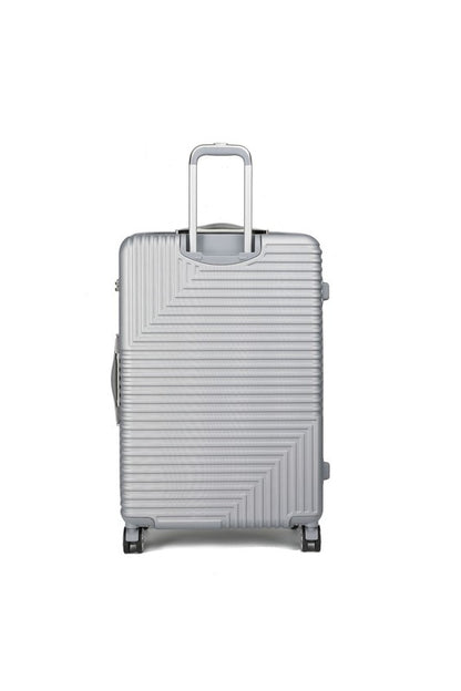 Durable hardshell luggage with a modern ribbed texture and smooth-rolling spinner wheels.