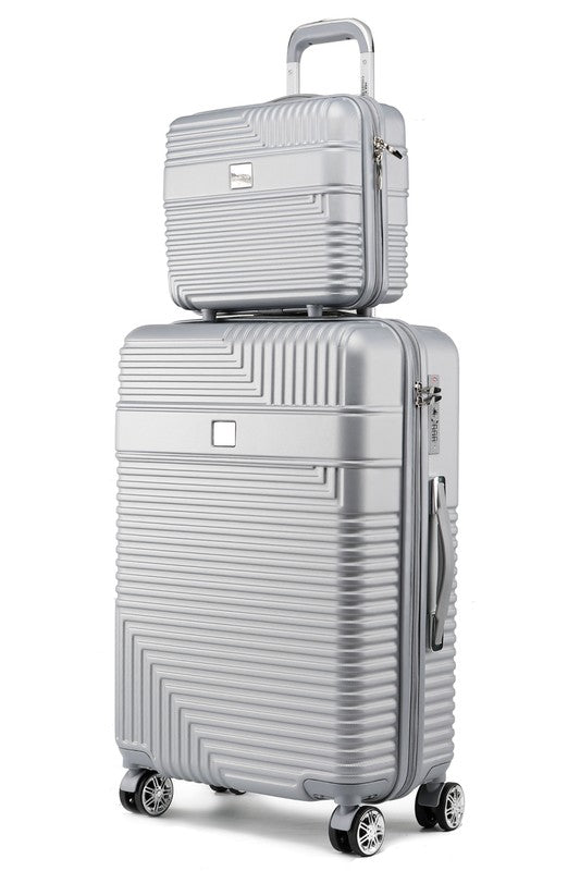 Coordinating travel luggage set with a modern ribbed pattern, ideal for short trips or business.