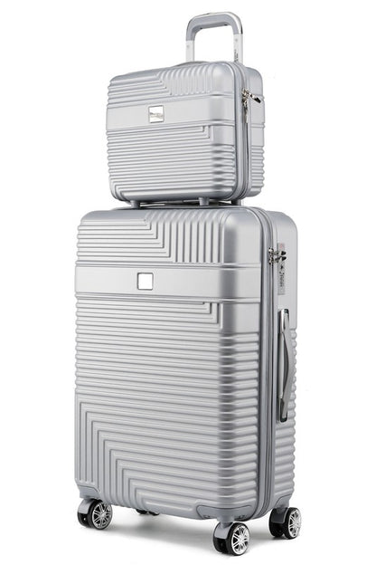 Coordinating travel luggage set with a modern ribbed pattern, ideal for short trips or business.