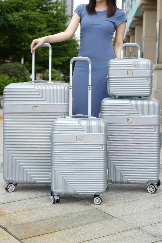 Complete travel luggage set including carry-on, medium, and large suitcases with durable hardside construction.