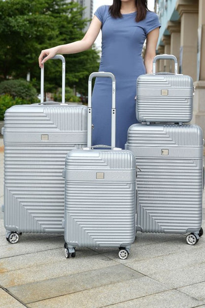 Complete travel luggage set including carry-on, medium, and large suitcases with durable hardside construction.