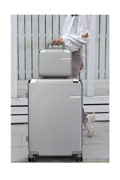 Two-piece hardshell luggage set in varying sizes, featuring a vertical ribbed texture and spinner wheels.