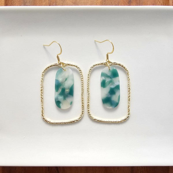 Grace in every glance. The Madison Earrings are a delicate fusion of earthy jade tones and dreamy opal shimmer. Designed for the modern romantic, these earrings bring a quiet luxury to your everyday look—refined, radiant, and effortlessly you.