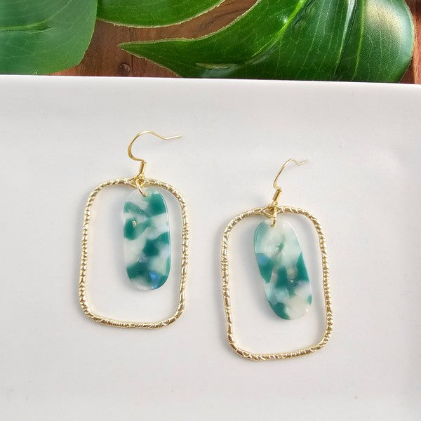 Grace in every glance. The Madison Earrings are a delicate fusion of earthy jade tones and dreamy opal shimmer. Designed for the modern romantic, these earrings bring a quiet luxury to your everyday look—refined, radiant, and effortlessly you.