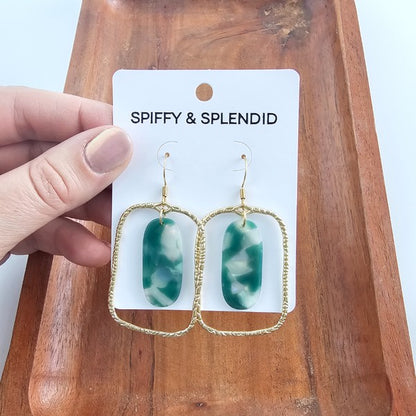 Grace in every glance. The Madison Earrings are a delicate fusion of earthy jade tones and dreamy opal shimmer. Designed for the modern romantic, these earrings bring a quiet luxury to your everyday look—refined, radiant, and effortlessly you.