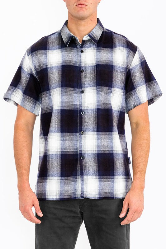 This men's plaid short-sleeve flannel offers a lightweight, breathable feel with a classic tartan pattern, making it a versatile casual layer for cooler days.