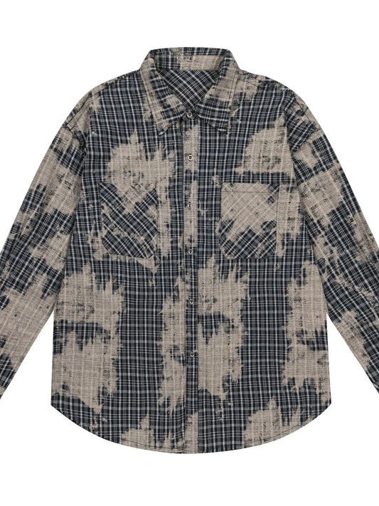 This men's button-down shirt features a distressed plaid pattern for a rugged, casual look and versatile wear.

