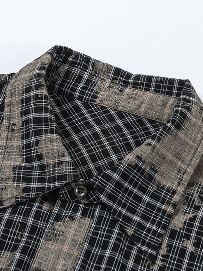 This men's button-down shirt features a distressed plaid pattern for a rugged, casual look and versatile wear.