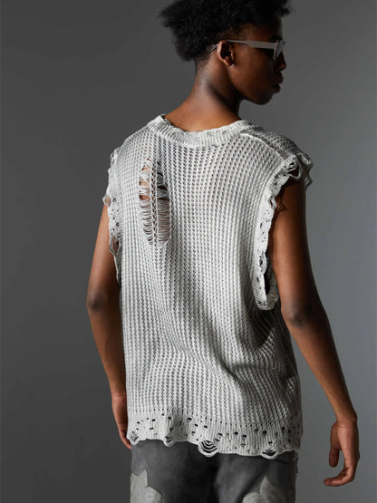 A stylish men’s distressed knit vest featuring intentionally frayed edges for a rugged, contemporary look.