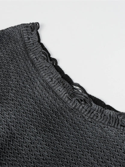 A stylish men’s distressed knit vest featuring intentionally frayed edges for a rugged, contemporary look.