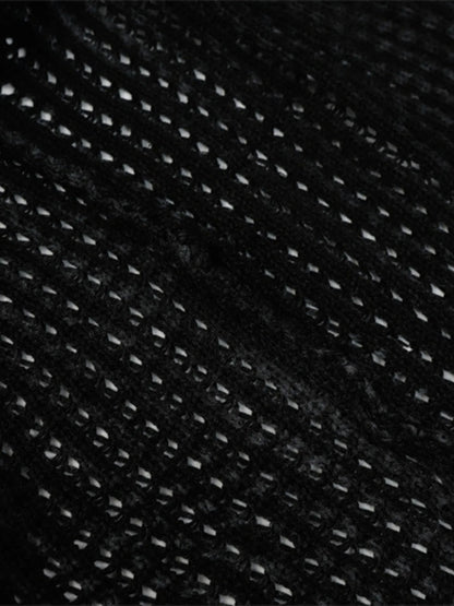 A stylish men’s distressed knit vest featuring intentionally frayed edges for a rugged, contemporary look.