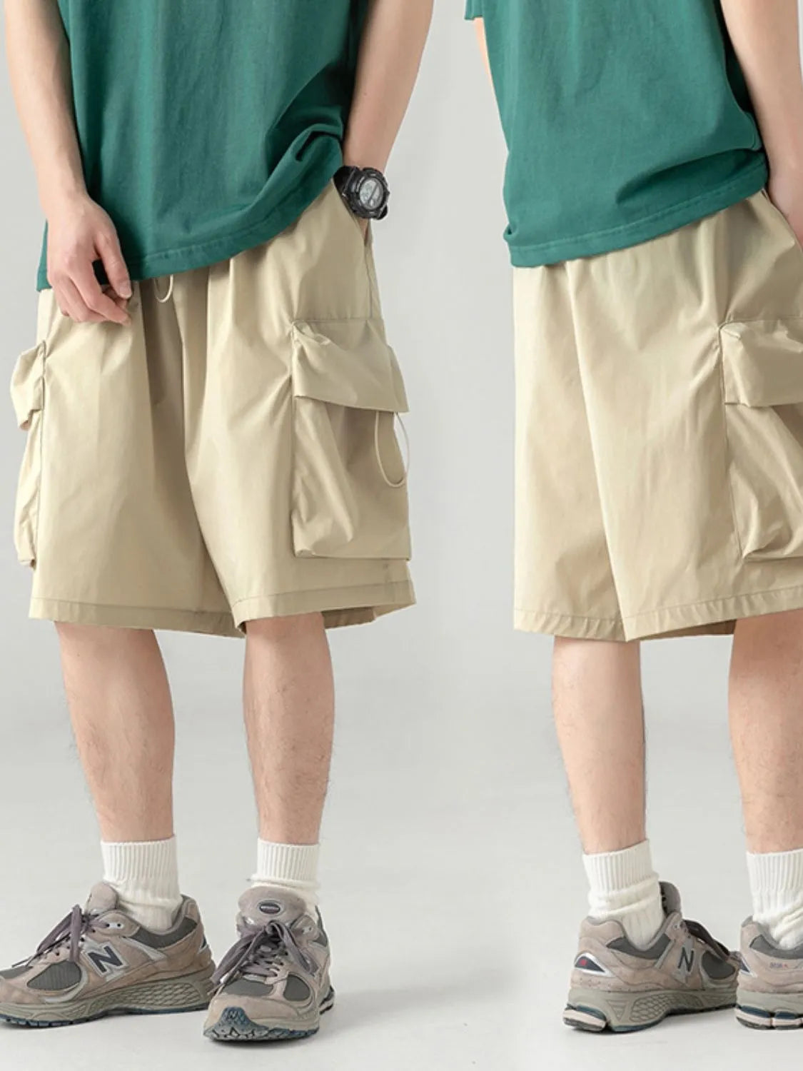 Two people wearing beige cargo shorts on a plain background