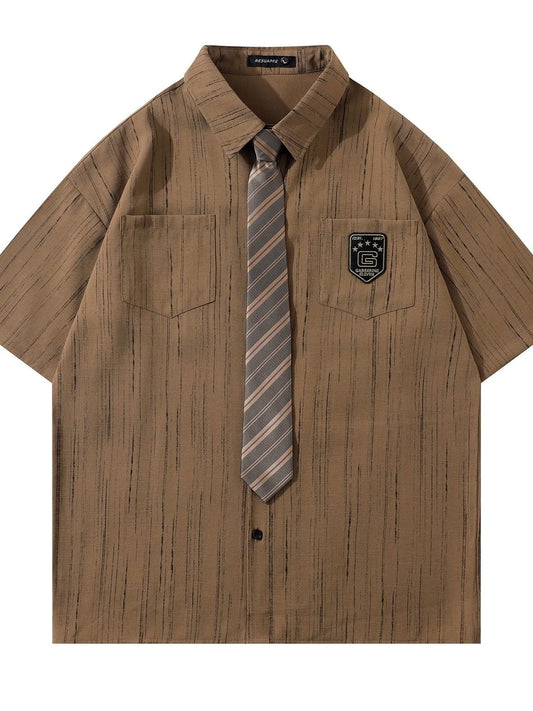 This men’s striped short-sleeve shirt with tie delivers a sharp, polished look with breathable, comfortable fabric and a coordinated tie for effortless styling.

