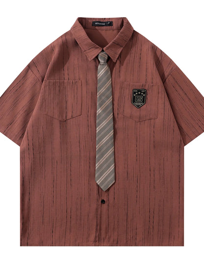 This men’s striped short-sleeve shirt with tie delivers a sharp, polished look with breathable, comfortable fabric and a coordinated tie for effortless styling.