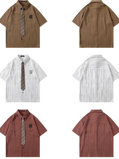 This men’s striped short-sleeve shirt with tie delivers a sharp, polished look with breathable, comfortable fabric and a coordinated tie for effortless styling