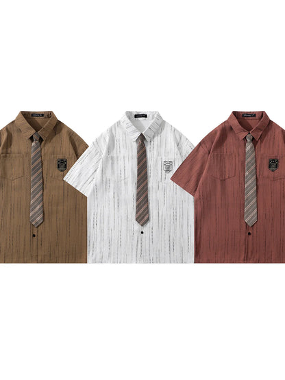 This men’s striped short-sleeve shirt with tie delivers a sharp, polished look with breathable, comfortable fabric and a coordinated tie for effortless styling.