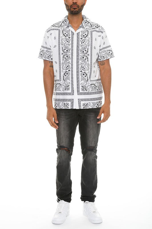 This men's collared print button-down shirt features a crisp collar, a front button placket, and a stylish all-over print for a polished yet casual look.

