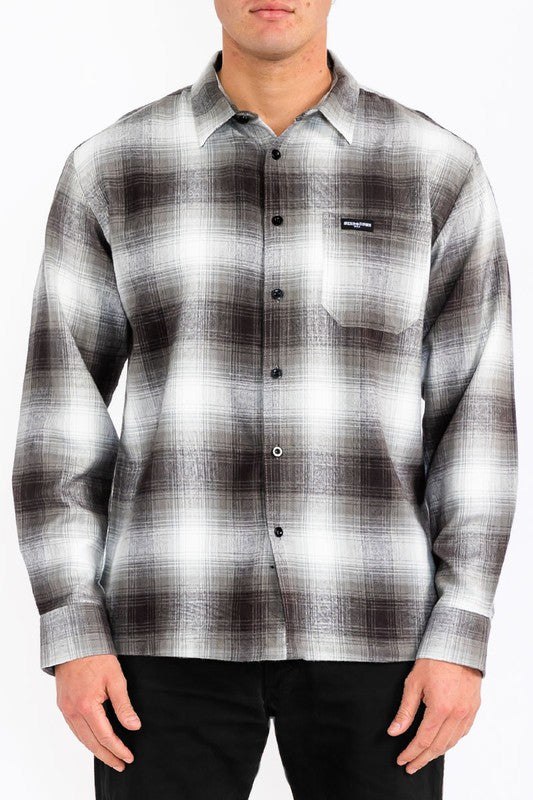 The mens-plaid-long-sleeve-flannel-2 is a comfortable, classic plaid flannel shirt featuring long sleeves and a cozy, soft fabric perfect for casual wear.