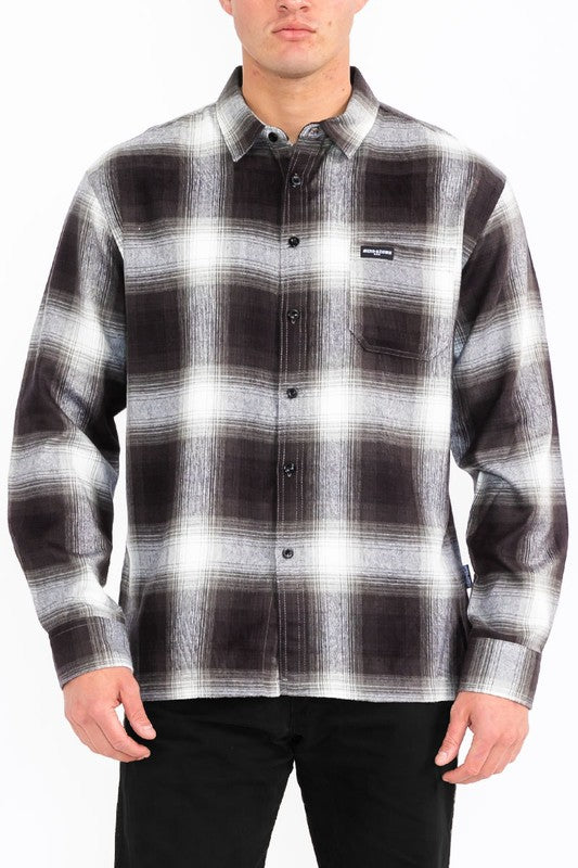This men's plaid long-sleeve flannel shirt combines classic patterning with soft, breathable fabric for timeless comfort and versatile, everyday style.
