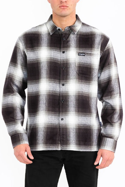 This men's plaid long-sleeve flannel shirt combines classic patterning with soft, breathable fabric for timeless comfort and versatile, everyday style.