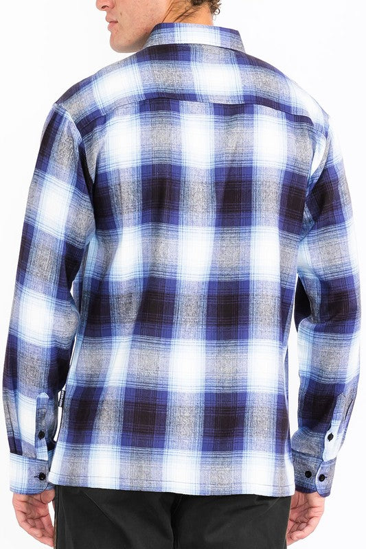 This men's plaid long-sleeve flannel shirt combines classic patterning with soft, breathable fabric for timeless comfort and versatile, everyday style.
