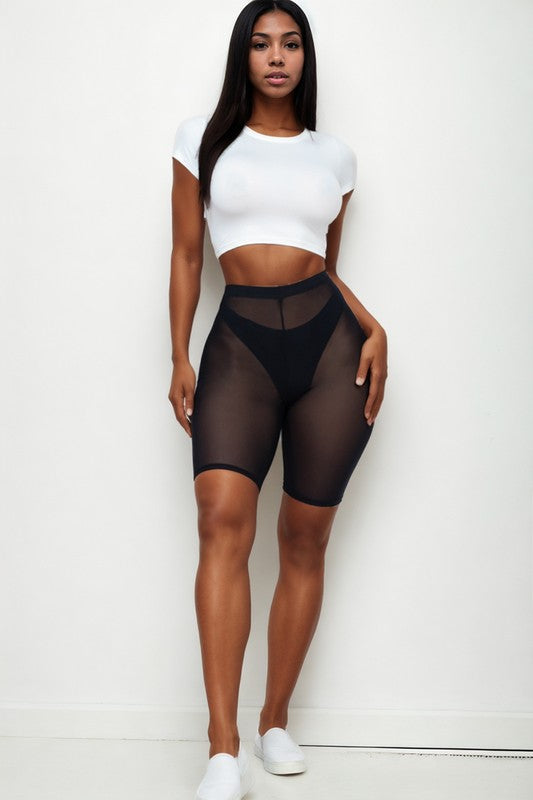 High-waisted sheer mesh biker shorts for women in black, lightweight and breathable with elastic waistband.