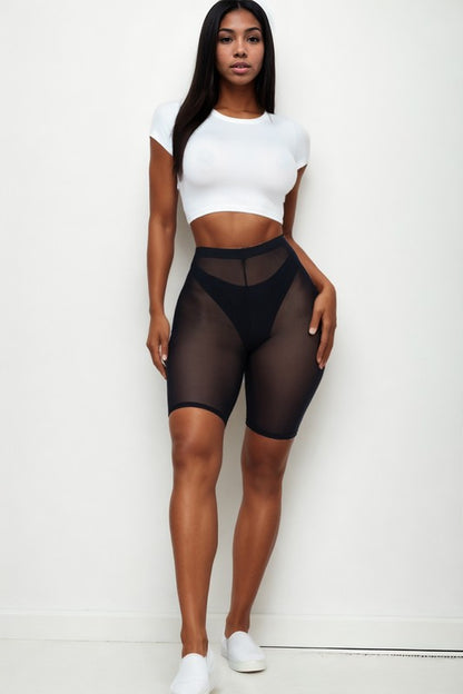 High-waisted sheer mesh biker shorts for women in black, lightweight and breathable with elastic waistband.