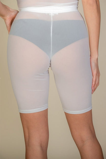 High-waisted sheer mesh biker shorts for women in white, lightweight and breathable with elastic waistband.