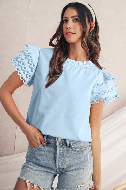 Ruffle layers give movement and texture — great for adding depth to your outfit. 