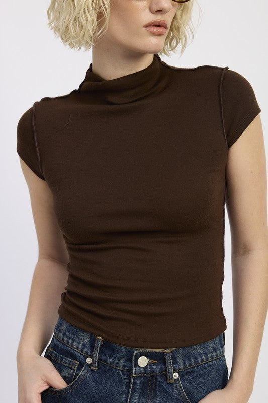 Exposed seams give edgy contrast detail and design interest. 